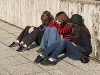 Photo of three young people sitting